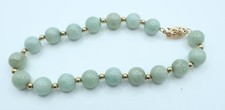 14K Gold clasp and beads Jadeite bead bracelet World Wide Imports Hong Kong