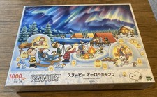 Puzzle PEANUTS Snoopy Aurora Camp 1000 Teile Epoche 2025 via FedEx