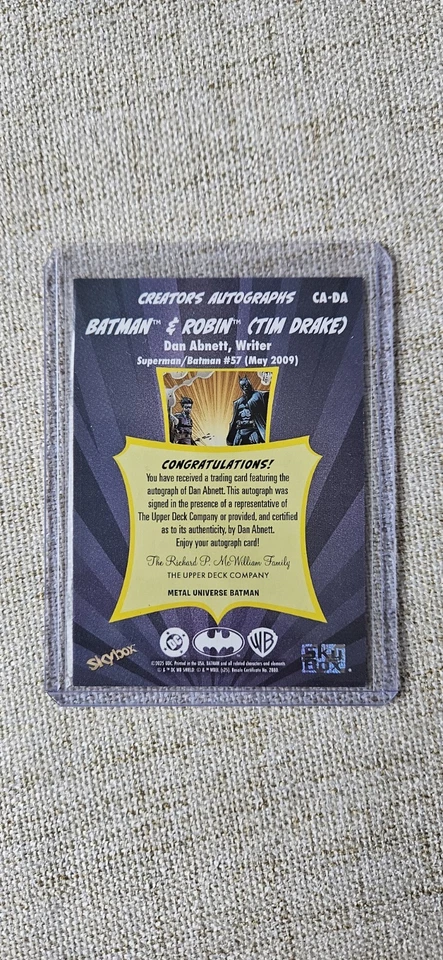 🦷2025 Metal Universe BATMAN Creators Autographs Batman & Robin Dan Abnett - Image 2 of 2