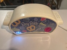Easy-Bake Ultimate Oven- parts only/Untested. Powers on as seen in pictures.