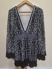 River Island black and white embriodered romper/playsuit angel sleeve size Large