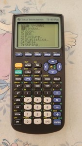 Texas Instruments TI-83 Plus Graphing Calculator with Cover