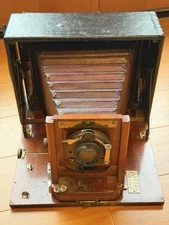 VINTAGE 5x7 CAMERA made of LEATHER, POLISHED WOOD, BRASS LENS & MAROON BELLOWS