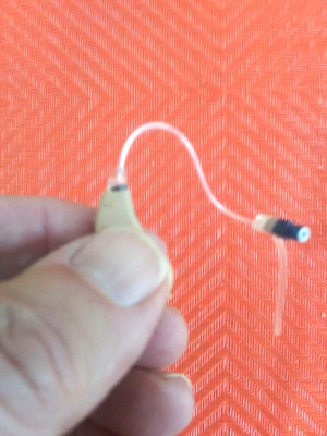 Programmable mini BTE R I C hearing aid right fit 4 programs 2 mics