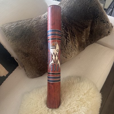 hand-painted In Aruba bamboo Rain Stick.  Makes a beautiful water fall sound. 