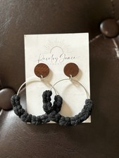 Black Crochet Hoops Earrings With Wooden Like At The Top Of The Ear