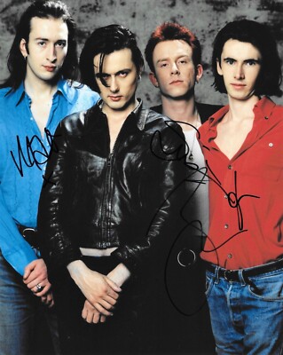suede rock band altogether before a music gig during the 1990's