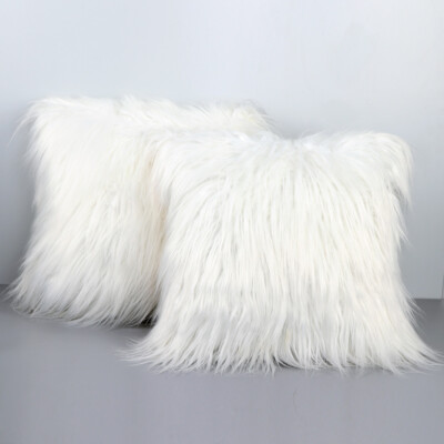 white furry cushions