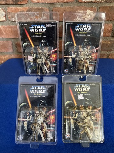 LOTTO PORTACHIAVI 1996 STAR WARS Darth Vader Luke Skywalker Artoo-Detoo See-Threepio - Foto 1 di 22