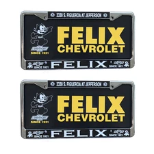 2 Metal Chrome License Plates and 2 Plastic Black Legacy Inserts