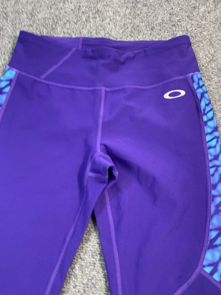 Leggings Oakley para mujer pequeños morados pierna cónica elásticos ligeros Foto 3 de 4