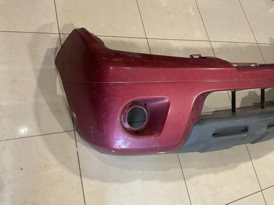 Cubierta de parachoques delantero roja Nissan Frontier 62022+zl00b 2009-2021 OEM Foto 4 de 4
