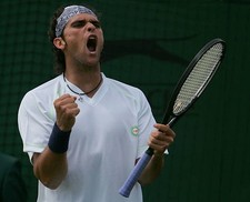 Mark Philippoussis of Australia celebrates at his second round ma- 2004 Photo 1