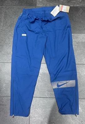 Nike Dri-FIT Men's Blue Track Trousers Ankle Zips Size L 33in Waist - Image 1 of 3