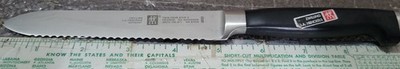 Zwilling J.A. Henckels 5'' Serrated Knife 30070-130 Twin Four Star II, Good Cond