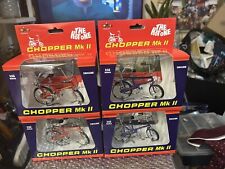 4 X RALEIGH CHOPPER 1:12 DIE-CAST MODELS- INC: INFA RED & ULTRA VIOLET NEW