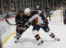 Ronald Petrovicky Atlanta Thrashers steps into Keith Carney - Ice Hockey Photo