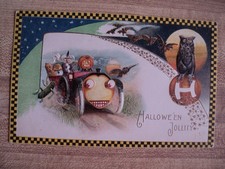 HALLOWEEN WITCH & J-O-L Man in CAR vintage WINSCH #4842 embossed Postcard