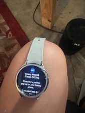 Samsung Galaxy Watch6 Classic Silver Aluminum Case White Silicone Band