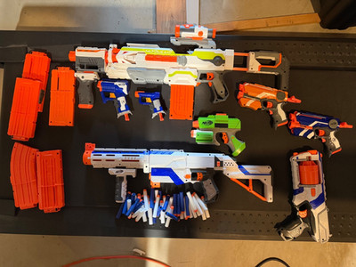 Lot Of 7 Nerf Guns Multiple different Models with Modulus Tested Please Read