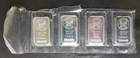 Four Sunshine Minting 1oz Silver Eagle Bars in Plastic