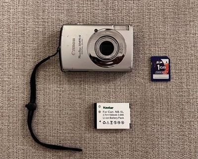 Canon PowerShot SD870 IS 8.0MP 3.8x Zoom Digital ELPH Camera + 1GB SD + Battery