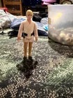 luke sky walker action figure.  Look this is old af.  1977.  Got this as a kid
