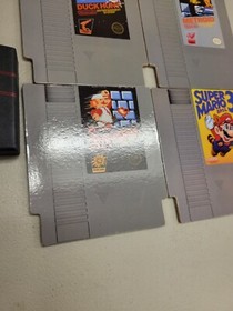 4x NINTENDO NES CARTRIDGE COASTERS UNUSED WITH CASE MARIO BROS METROID DUCK HUNT