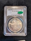 1884 CC Morgan Silver Dollar MS 65 PCG CAC Brilliant White Coin Great Eye Appeal
