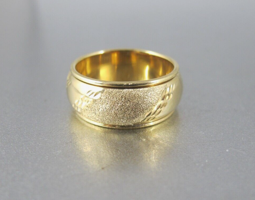 Alianza de boda giratoria con corte de diamante texturizado de oro amarillo sólido de 10K - Imagen 2 de 7