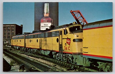 Milwaukee Road 105-111 Leaves Chicago 1967 Old Forester Billboard Postcard D35
