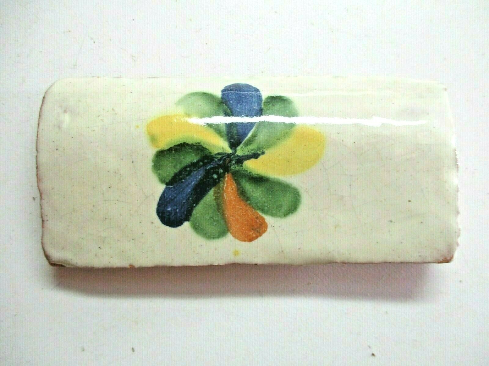 Terracotta 4" X 2" Radius Curved Wall Cap Corner Tile w/ Flower