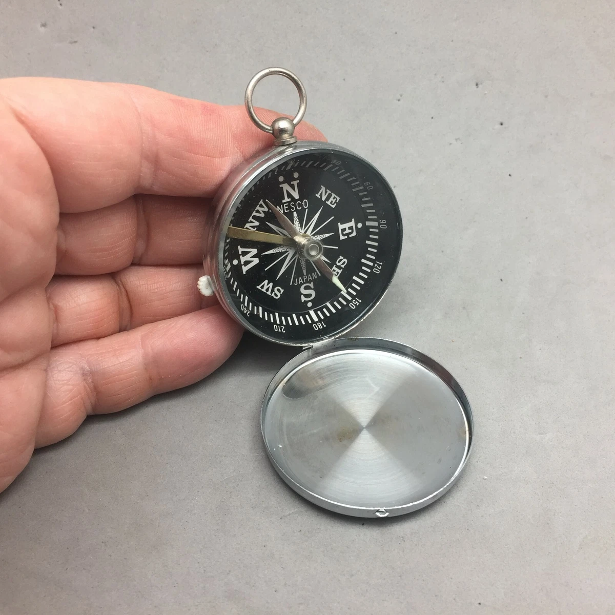Pocket watch shop and compass