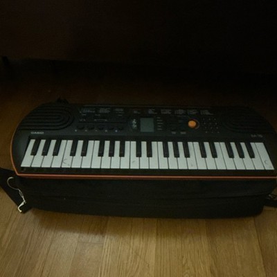 Casio SA-76 44-Key Electronic Keyboard, Built-in Speaker, Black/Orange