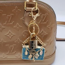 100% Auth Louis Vuitton Lock & Key with unbranded Bagcharm, Keycharm, Keychain