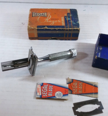 SEGAL Safety Razor  Chrome minty in worn box using unique vlades. box is worn