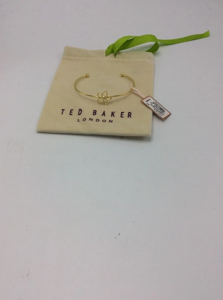 Brazalete fino Ted Baker tono dorado flor de cristal TB9 $45 Foto 4 de 4