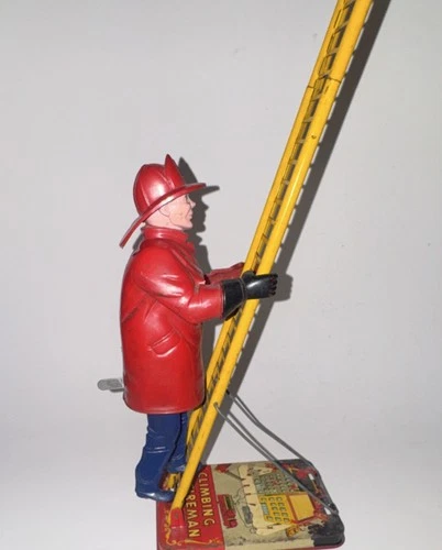 Vintage Marx Tin Climbing Fireman Ladder Wind Up Toy New York