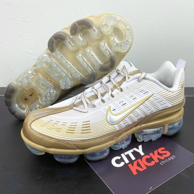 gold and white vapormax