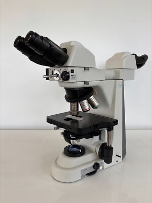 Nikon Eclipse 50i Microscope with 2X, 4X Fl, 20X Fl. Swing Condenser Dual Heads