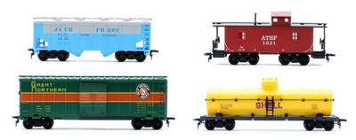 MODELL POWER SPUR ''HO'' SCHWADER MIT 4 VERSCHIEDENEN GÜTERWAGEN
