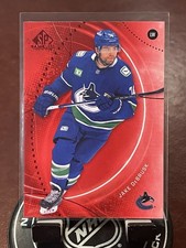 2025-26 Upper Deck SP Game Used Jake DeBrusk Red Parallel #75 Vancouver Canucks