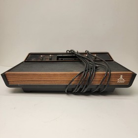 Atari 2600 Woodgrain 4-Switch Console &ndash; Untested for Parts or Repair