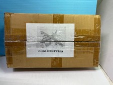 MAHOGANY C-130 HERCULES WITH STAND NICE I PIECE IS LOOSE WILL GLUE RIGHT BACK