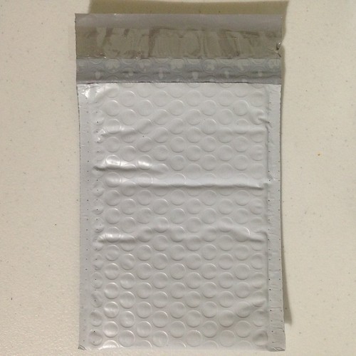 Size #000 4"x8" Self-Sealing White Poly Bubble Mailers Padded Shipping Envelopes - Picture 2 of 3