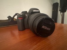 Nikon D3100 Digital SLR Camera 18-55mm With Sigma 70-300mm macro lens.