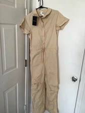 Fabletics Pure Luxe Kick Flare jumpsuit beige new with tags xsmall zip up