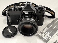 BLACK BODY NIKON FE 35MM SLR CAMERA 50MM F1.8 AF NIKKOR LENS FILTERS MORE  