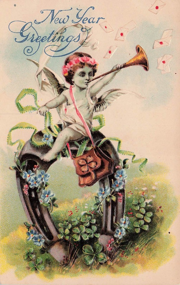 A century-old New Year's postcard featuring a genuinely unsettling green cherub on a steampunk leather purse — weird Victorian art meets functional oddity.