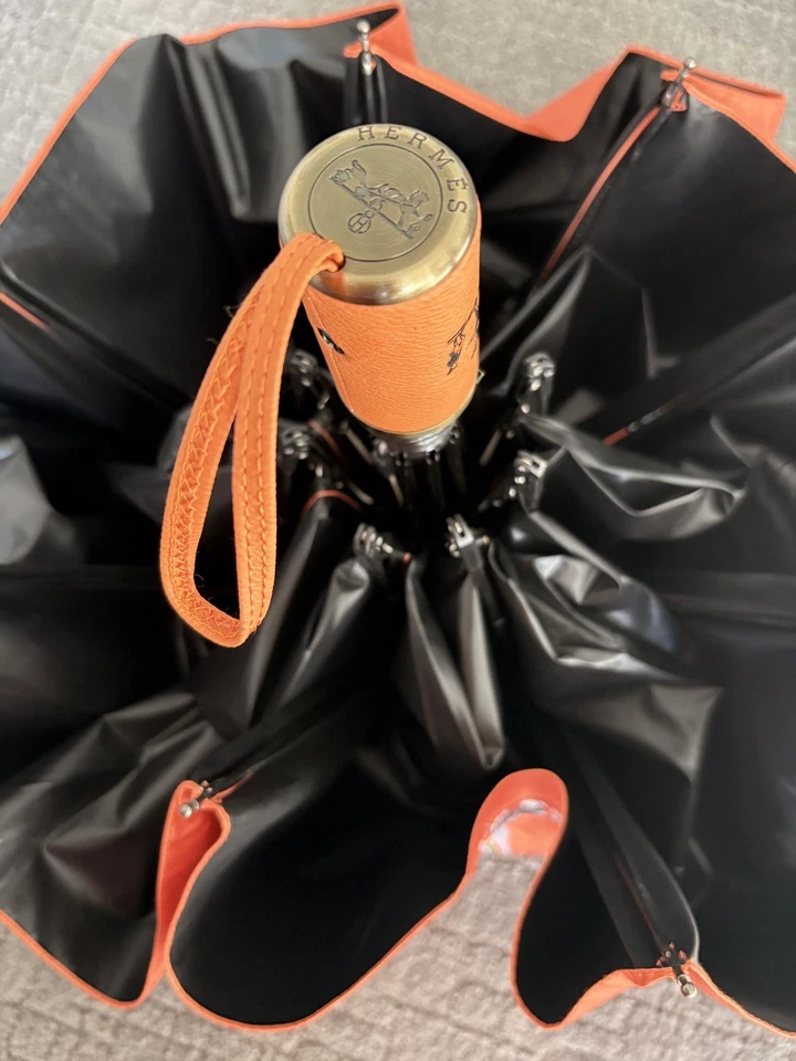 Sombrilla y paraguas de lluvia plegable automática Hermes para exteriores 99 % UV Foto 4 de 4